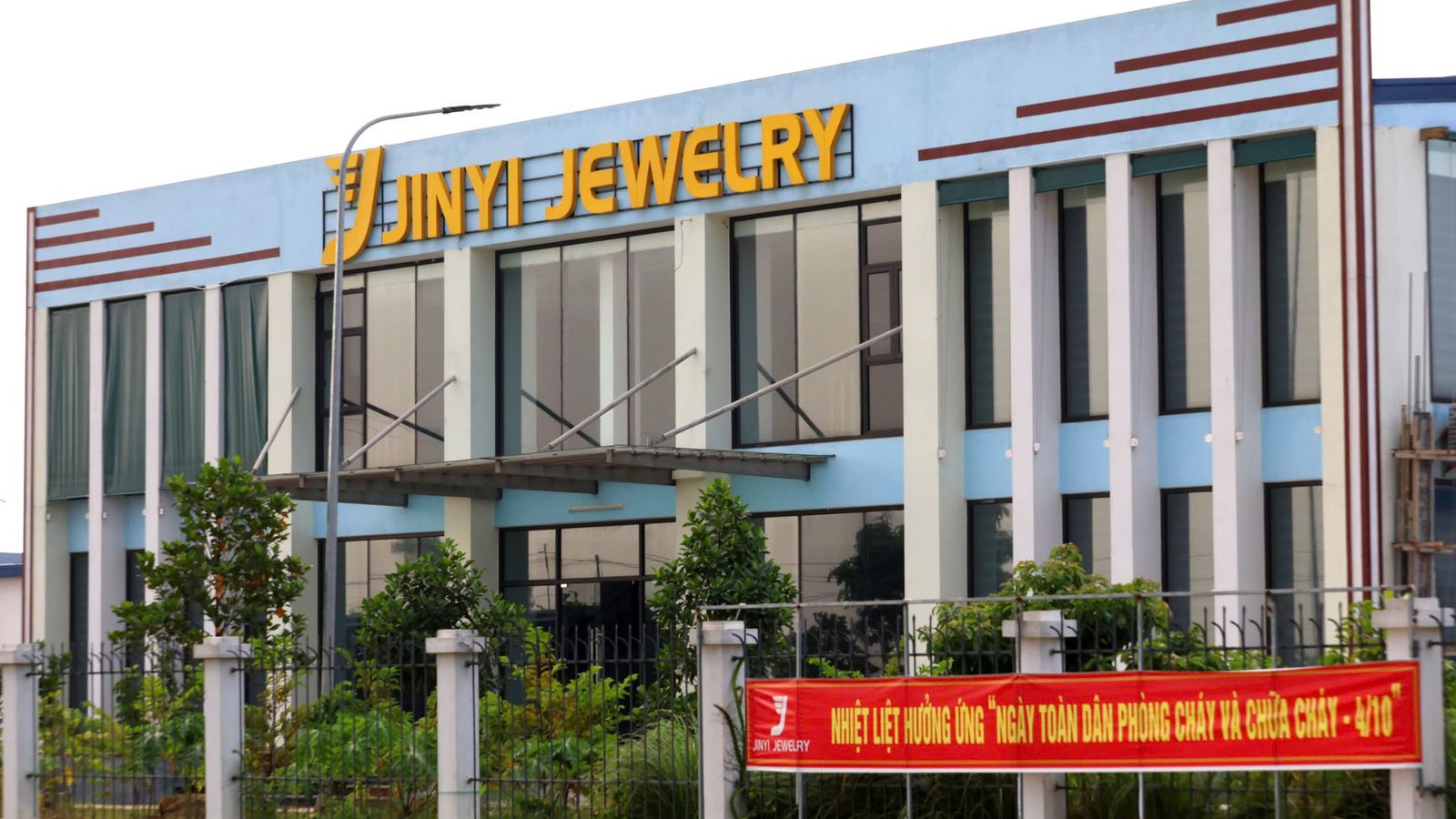 Jinyi Jewelry Vietnam manufacturing facility building with branded signboard in Thanh Hoa.