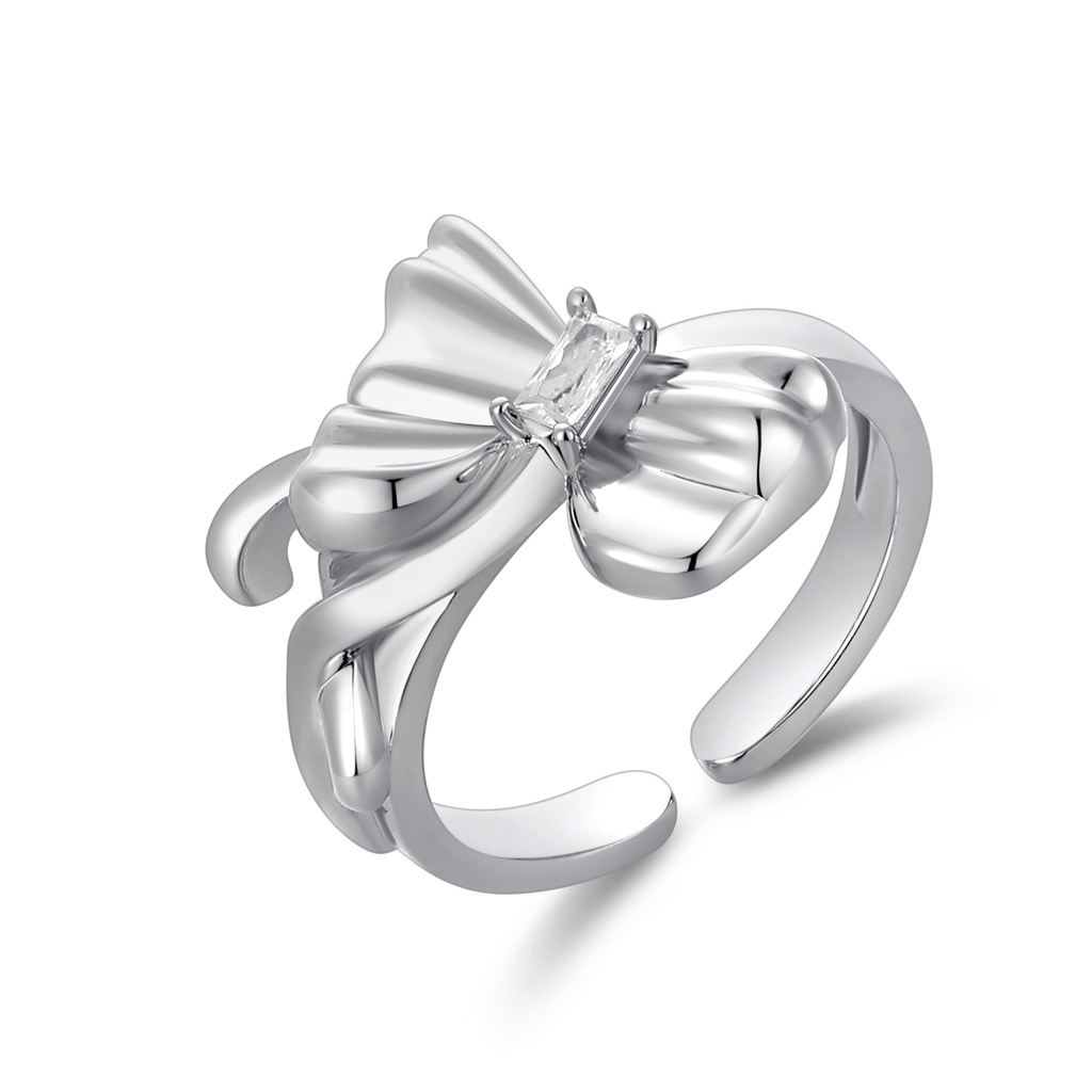 Elegant Silver-Plated Bow Ring with Shimmering Baguette Center Stone