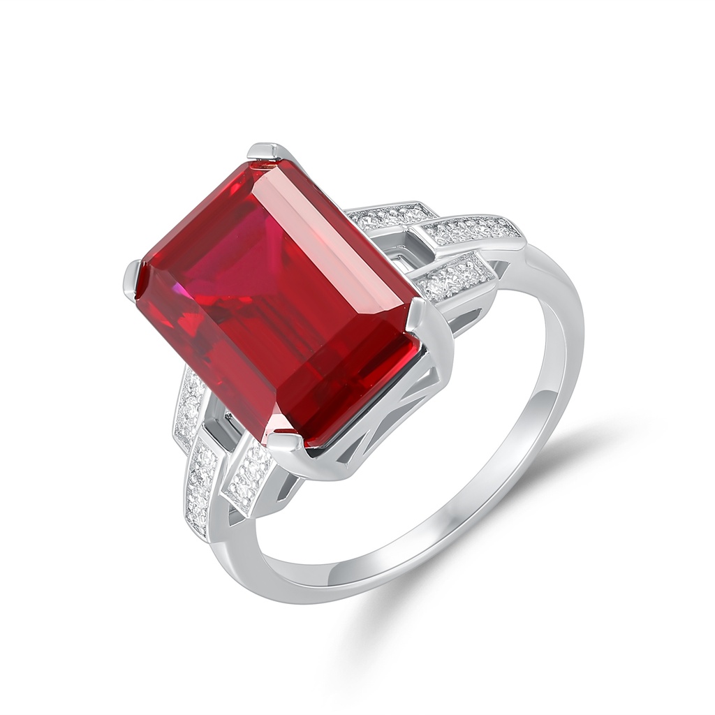 Elegant Stainless Steel Ring with Red Rectangular Gemstone and Sparkling Crystals.