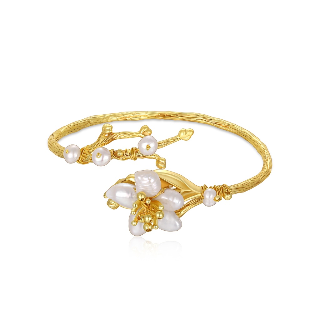 Gold floral bangle with freshwater pearls and organic branch motif