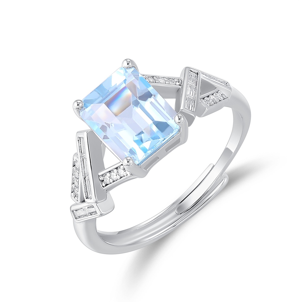 Icy Blue Emerald-Cut Ring with Geometric Crystal Side Accents