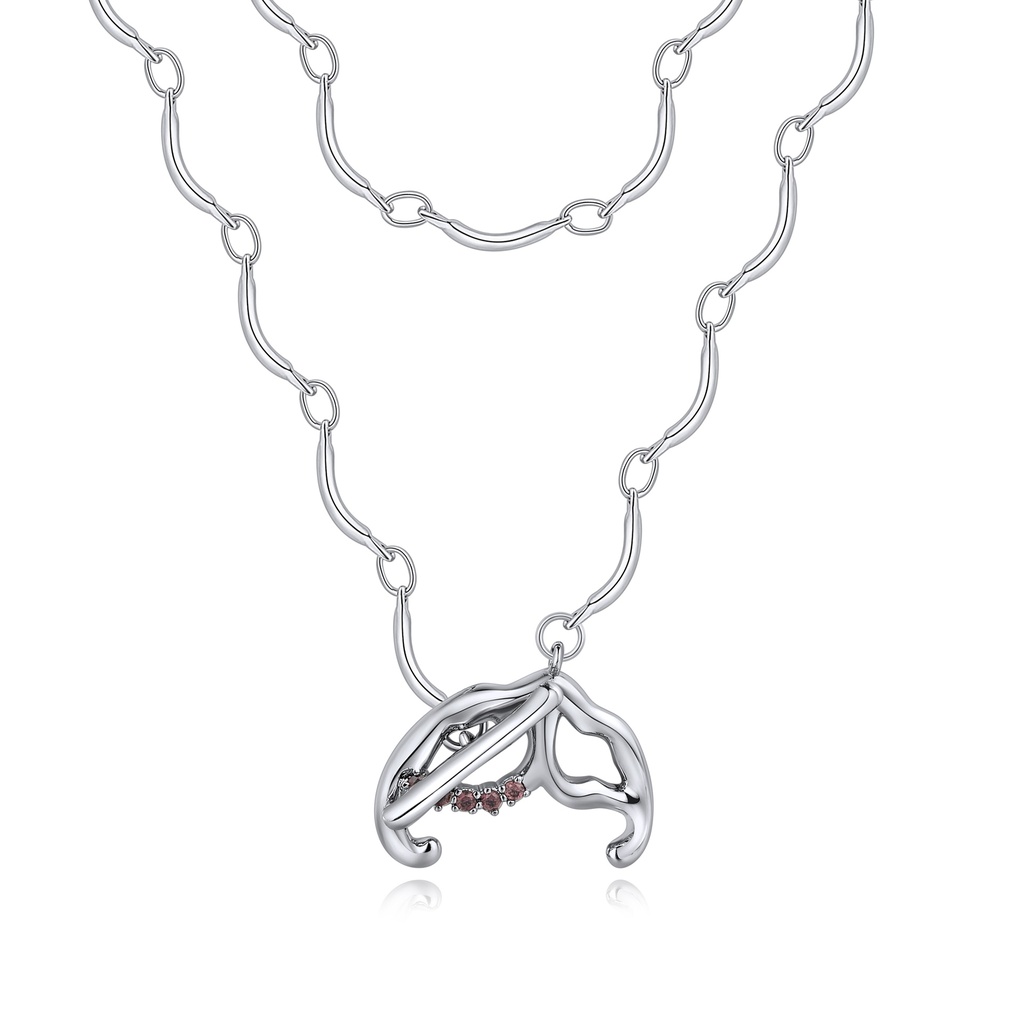 Sculptural silver necklace with abstract orchid-inspired centerpiece