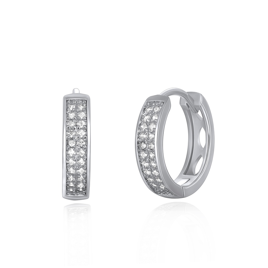 Chunky silver hoop earrings with bold textured crystal surface.